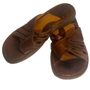 Born sandals size 7 slip in brown with leather uppers.